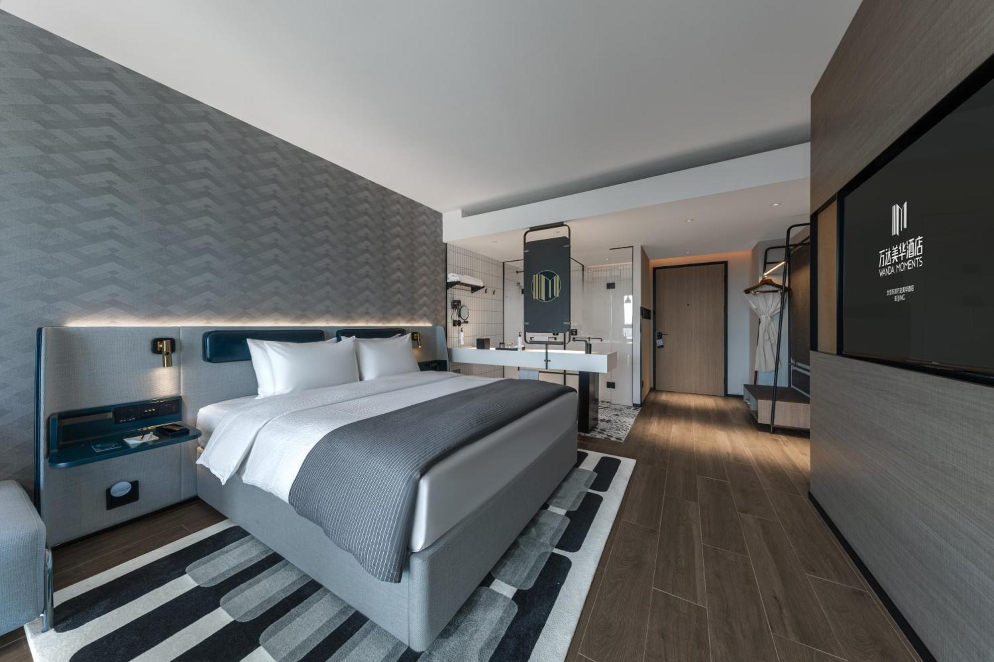 Wanda Moments Dongba Hotel 4*