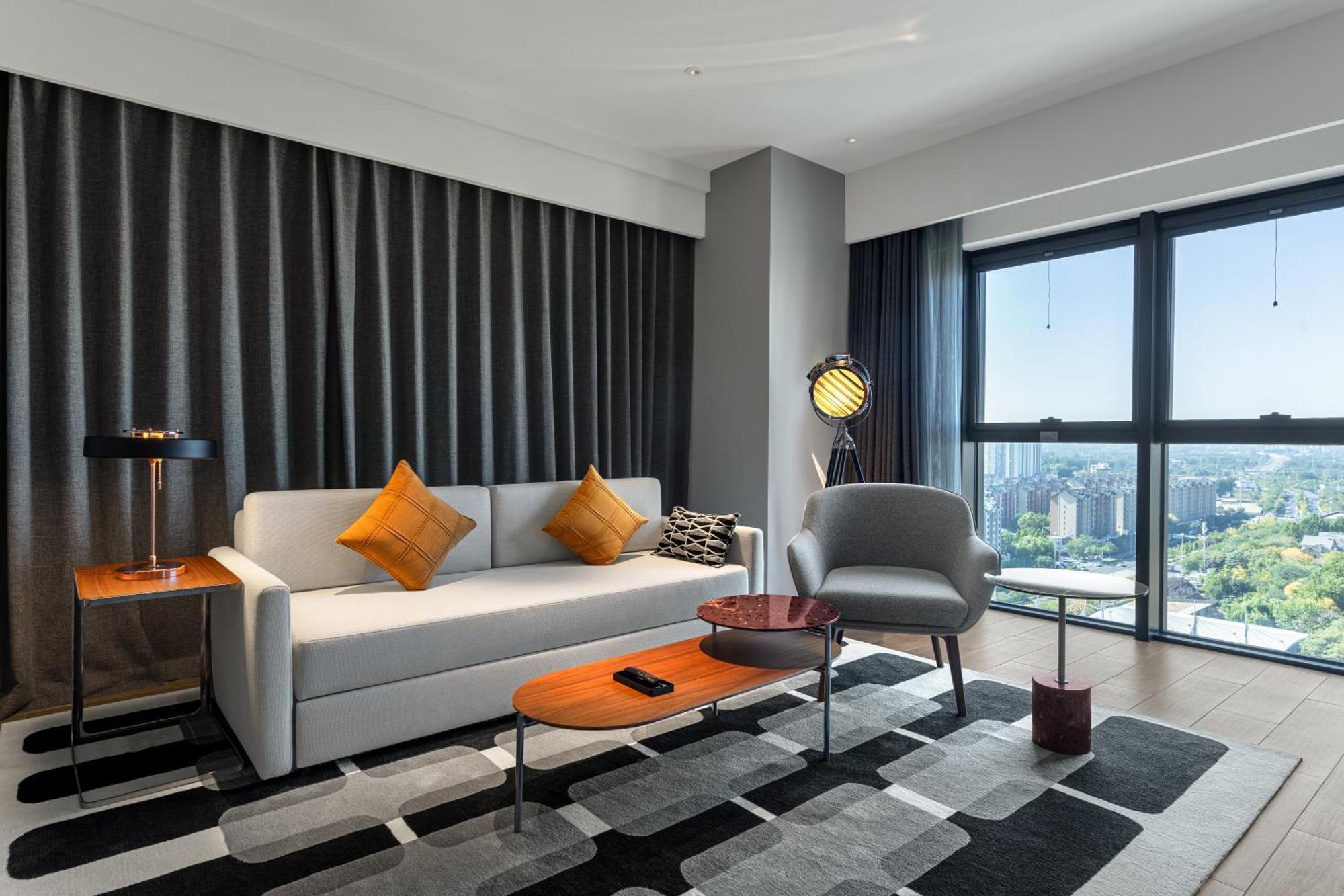Hotel Wanda Moments Dongba 4*